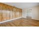 Bright living room featuring luxury vinyl floors, natural light, and a neutral paint color at 3994 Irma Shores Dr, Orlando, FL 32817