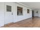 Tiled covered patio area with multiple entry/exit doors at 3994 Irma Shores Dr, Orlando, FL 32817