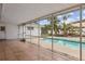 Covered patio with tiled flooring offering views of a private pool area at 3994 Irma Shores Dr, Orlando, FL 32817