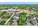 This aerial view captures a neighborhood, showcasing community closeness to schools, sports, and home amenities at 418 Curry Ct, Altamonte Springs, FL 32714
