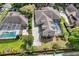 Aerial view of property, showing the backyard, pool, and a large multi-car garage at 418 Curry Ct, Altamonte Springs, FL 32714