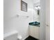 Clean and simple half bathroom with green accents, a framed mirror, and a toilet at 418 Curry Ct, Altamonte Springs, FL 32714