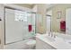 Bathroom featuring sliding glass shower doors with bright vanity and mirror at 418 Curry Ct, Altamonte Springs, FL 32714