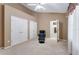 Cozy bedroom features two closets, and an ensuite bathroom with chair on light carpet at 418 Curry Ct, Altamonte Springs, FL 32714