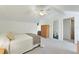 Bright bedroom with a ceiling fan, built-in storage, and an en-suite bathroom at 418 Curry Ct, Altamonte Springs, FL 32714