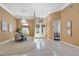 Formal dining and entry area boasting chandeliers, tile floors, and natural light at 418 Curry Ct, Altamonte Springs, FL 32714
