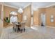 Formal dining area featuring neutral tones, elegant lighting, and tile flooring at 418 Curry Ct, Altamonte Springs, FL 32714