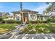 Beautiful home with well-kept lawn, mature trees, and a striking red front door at 418 Curry Ct, Altamonte Springs, FL 32714