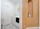 Laundry room featuring washing machine and dryer, with utility sink and closet at 418 Curry Ct, Altamonte Springs, FL 32714