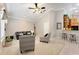 Living room featuring vaulted ceiling, neutral colors, ceiling fan, and natural light at 418 Curry Ct, Altamonte Springs, FL 32714