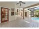Large, covered patio adjacent to a private screened-in pool, perfect for entertaining at 418 Curry Ct, Altamonte Springs, FL 32714