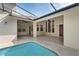 Beautiful outdoor living space featuring a private pool and covered patio with ceiling fans at 418 Curry Ct, Altamonte Springs, FL 32714