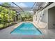 Sparkling pool inside screened enclosure with beautiful backyard views and ample deck space at 418 Curry Ct, Altamonte Springs, FL 32714