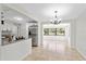 Open-concept dining area with a view to the backyard at 4415 Gilpin Way, Orlando, FL 32812