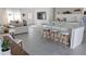 This open floor plan features a large kitchen island perfect for entertaining overlooking the living space at 4443 Doris Dr, New Smyrna Beach, FL 32169