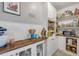 Bright and airy pantry equipped with modern appliances and an abundance of storage space at 4443 Doris Dr, New Smyrna Beach, FL 32169