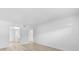 Clean, bright bedroom with wood-look floors and access to a connected bathroom at 500 Newell Hill Rd # 113A, Leesburg, FL 34748