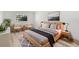 Inviting main bedroom featuring a cozy bed, stylish decor, and ample natural light at 500 Newell Hill Rd # 113A, Leesburg, FL 34748