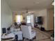 Bright living room featuring tile flooring, a ceiling fan, and plenty of natural light at 509 Dorothy Cir, Eustis, FL 32726