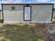 Exterior photo of shed with metal roof and decorative star on the facade at 509 Dorothy Cir, Eustis, FL 32726
