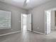 A large bedroom with tile floors and a convenient ensuite bathroom at 5144 City St # 211, Orlando, FL 32839