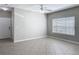 Bright living area with tile flooring, neutral wall colors, and natural lighting at 5144 City St # 211, Orlando, FL 32839