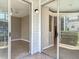 Screened in patio provides a view of the interior living space and the building's exterior at 5144 City St # 211, Orlando, FL 32839