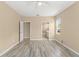 Spacious bedroom boasts natural light, ceiling fan, and ample closet space at 558 Knollwood Dr, Davenport, FL 33837