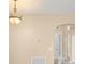 Beige dining room featuring cream walls and modern chandelier at 558 Knollwood Dr, Davenport, FL 33837