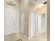 Inviting foyer featuring tile flooring and neutral paint, leading to other areas of the home at 558 Knollwood Dr, Davenport, FL 33837