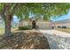 Front exterior view of home; showing front door and a two car garage at 558 Knollwood Dr, Davenport, FL 33837