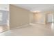 Open concept living room and dining room with tile floors at 558 Knollwood Dr, Davenport, FL 33837