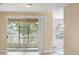 View of living room sliding glass doors leading to the outside at 558 Knollwood Dr, Davenport, FL 33837