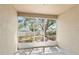 Screened patio offering backyard views and outdoor living space at 558 Knollwood Dr, Davenport, FL 33837