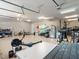 Spacious garage with high ceilings and ample storage for multiple vehicles and equipment at 6313 Bordeaux Cir, Sanford, FL 32771
