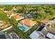Aerial view of the home highlighting a lush backyard and sparkling swimming pool at 652 Rochester St, Oviedo, FL 32765