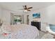 Bright main bedroom with ensuite bath and sliding door to patio at 652 Rochester St, Oviedo, FL 32765
