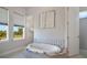Bright bathroom with a luxurious soaking tub with marble surround at 748 Desert Mountain Ct, Reunion, FL 34747