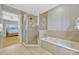 Bathroom featuring glass enclosed shower with a view into an adjacent bedroom at 7652 Whisper Way # 301, Reunion, FL 34747
