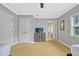 Bedroom with wall art, a dresser with a TV, ceiling fan, and doorway to the bathroom at 7652 Whisper Way # 301, Reunion, FL 34747