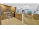 Updated kitchen with stainless steel appliances, granite countertops and an open floor plan at 7652 Whisper Way # 301, Reunion, FL 34747