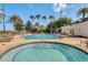 Inviting pool and jacuzzi area with lounge chairs, offering a relaxing outdoor experience in a sunny setting at 7652 Whisper Way # 301, Reunion, FL 34747