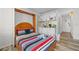 Compact kitchenette with modern appliances and convenient bed access at 800 N Atlantic Ave # 417, Daytona Beach, FL 32118