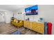 Relaxing living area featuring a comfortable couch, a flat screen television and stylish decorative accents at 800 N Atlantic Ave # 417, Daytona Beach, FL 32118