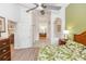 Bedroom with a view of the ensuite bath, tub and closet at 8100 Poinciana Blvd # 2109, Orlando, FL 32821