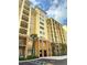 Inviting condominium featuring a meticulously kept exterior with a beautiful architectural design and lush landscaping at 8100 Poinciana Blvd # 2109, Orlando, FL 32821