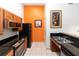 Modern kitchen with granite countertops, stainless steel appliances, and efficient layout providing seamless culinary experience at 8100 Poinciana Blvd # 2109, Orlando, FL 32821