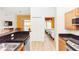 Open-concept living area offering cozy seating and sliding glass doors to the outside, connected to the kitchen area at 8100 Poinciana Blvd # 2109, Orlando, FL 32821