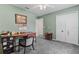 Bedroom featuring carpet flooring, ceiling fan, closet and a bright window providing natural light, offering a relaxing space at 817 Benton Lake S Dr, Deland, FL 32724