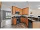 Modern kitchen features stainless steel appliances, granite countertops and stylish tile floors at 817 Benton Lake S Dr, Deland, FL 32724